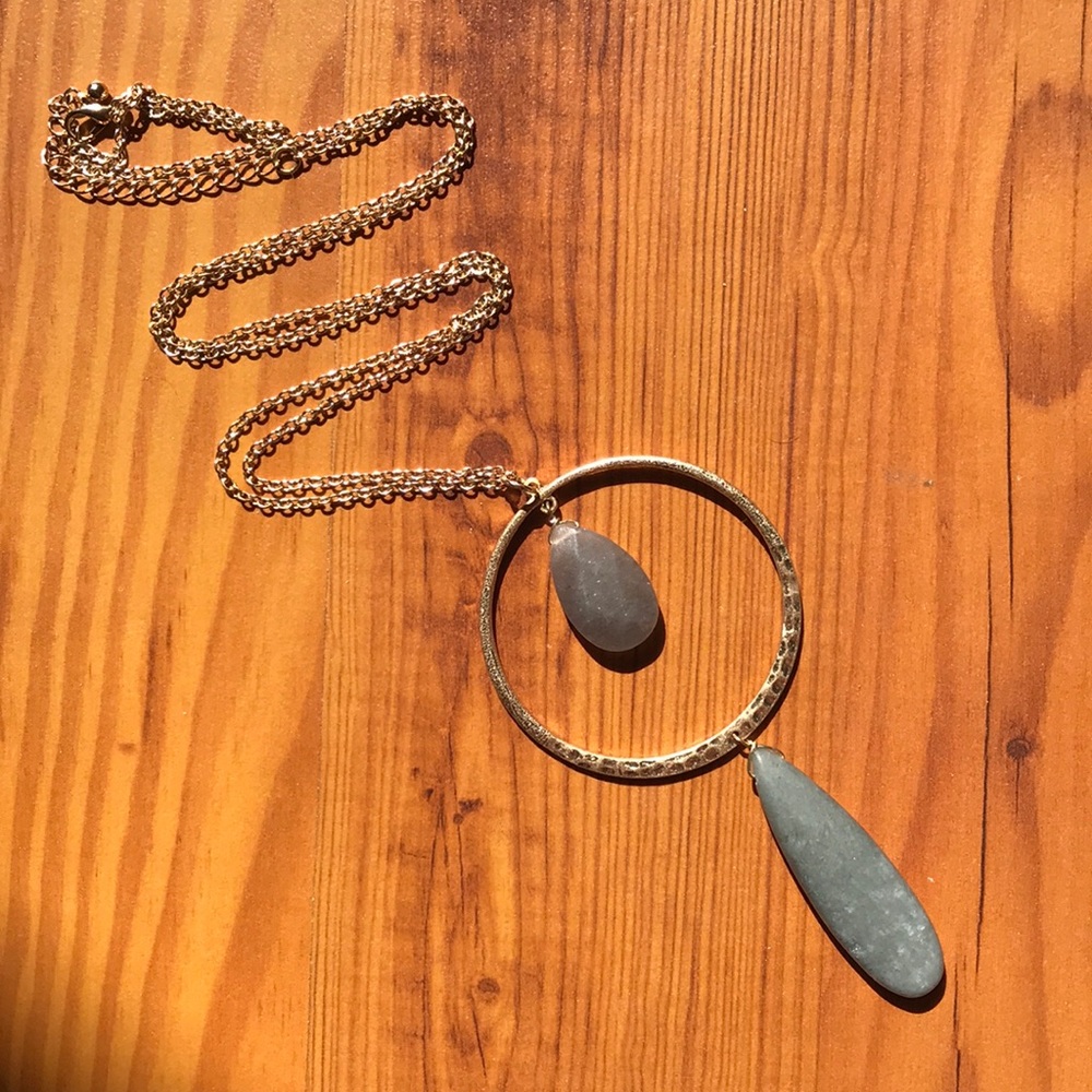 long necklace with gray stones and gold hardware
